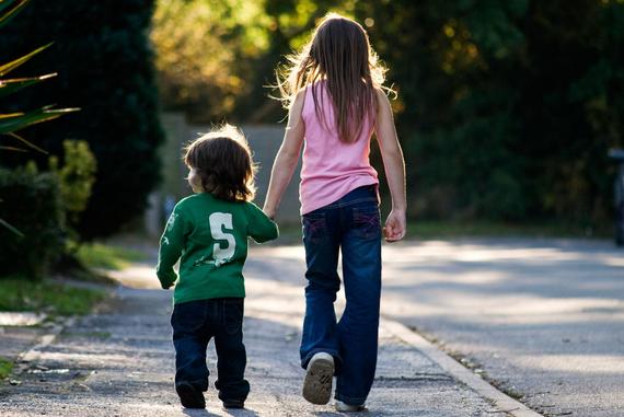 Two lost children walking down a road.. Image shot 2008. Exact date unknown.